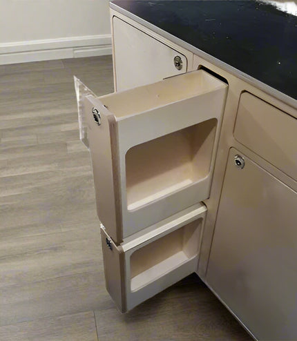 Slim, two compartment cabinet made for van life sits inside kitchen cabinet keeping spices, bottles tucked securely away