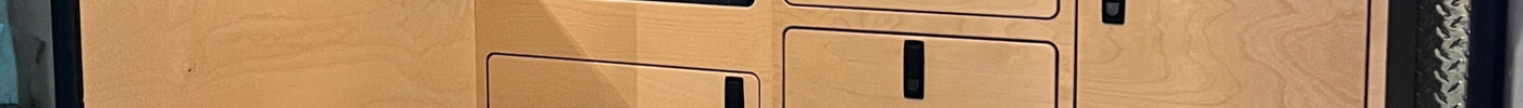 interior build of a mercedes sprinter with wooden cabinets