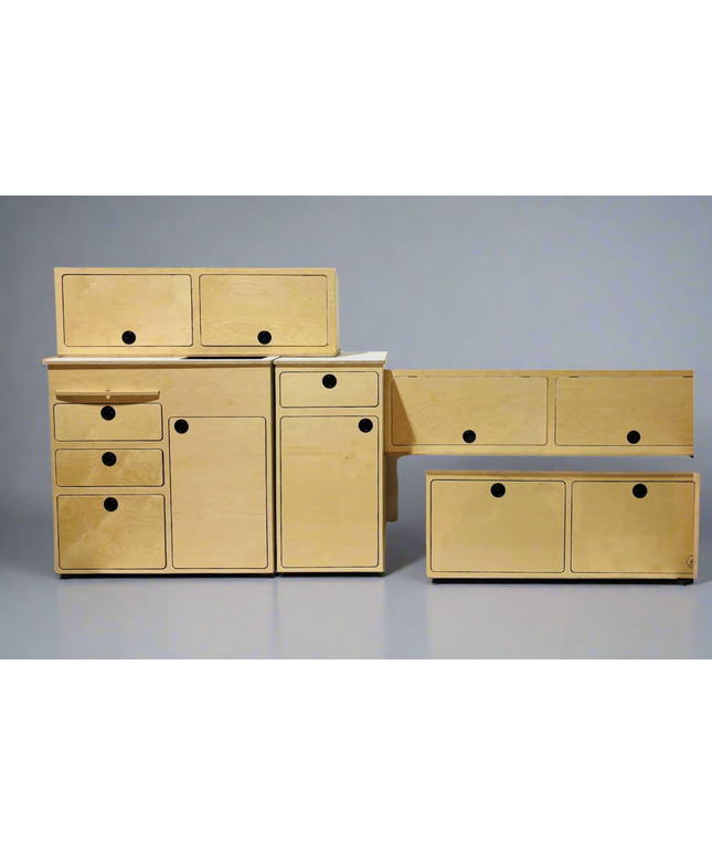 4 separate pieces of modern birch plywood furniture and storage crafted for weekend camper van adventures and van life!