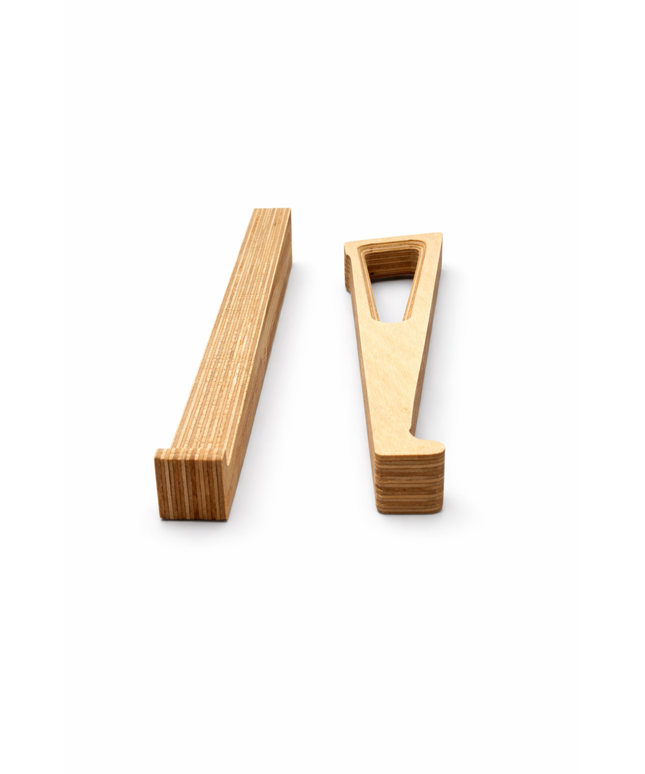 Two wooden laptop risers on a white surface