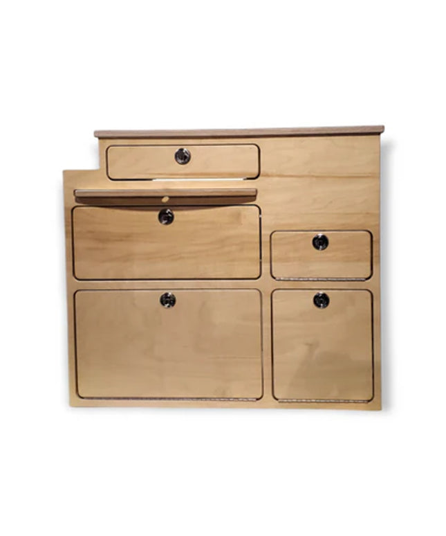 View of kitchen cabinet with five drawers and pull out surface, great for micro van conversions