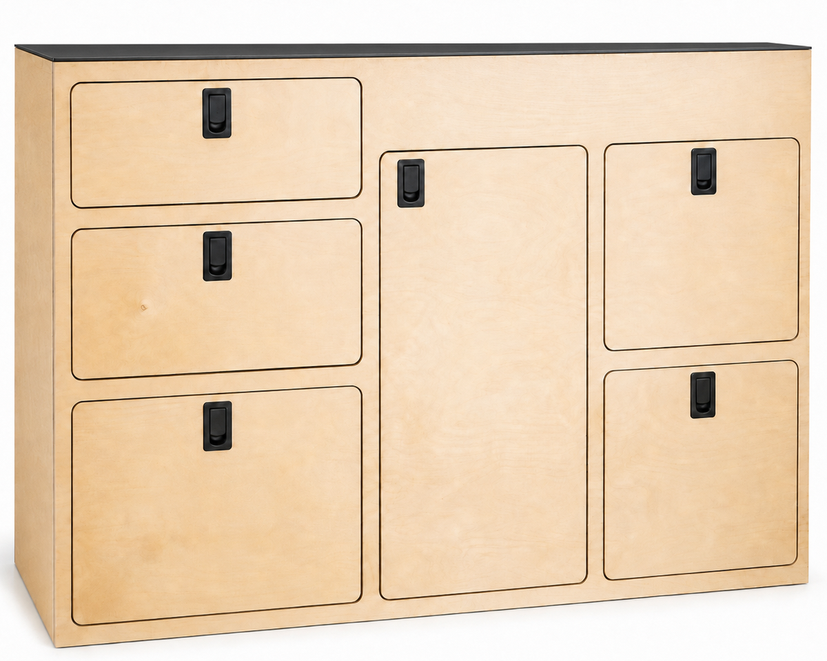 Overland Interiors 54-inch kitchenette for high-roof camper vans, featuring birch plywood cabinetry, a slim black laminate countertop and black marine-grade compression latches.