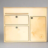 Front view of a 36-inch kitchen cabinet with drawers and storage door for camper van and overland vehicle conversions by Overland Interiors