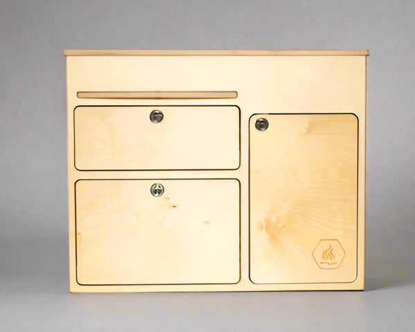 Front view of a 36-inch kitchen cabinet with drawers and storage door for camper van and overland vehicle conversions by Overland Interiors