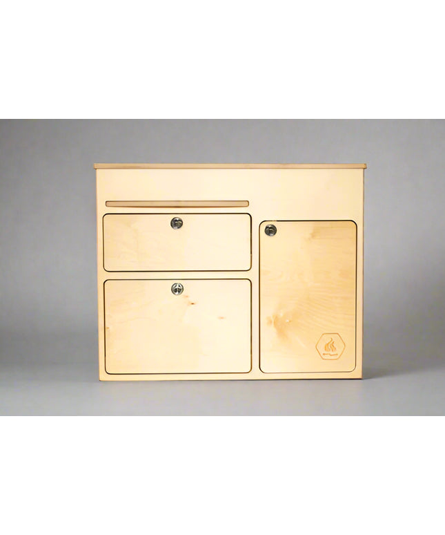 Front view of a 36-inch kitchen cabinet with drawers and storage door for camper van and overland vehicle conversions by Overland Interiors
