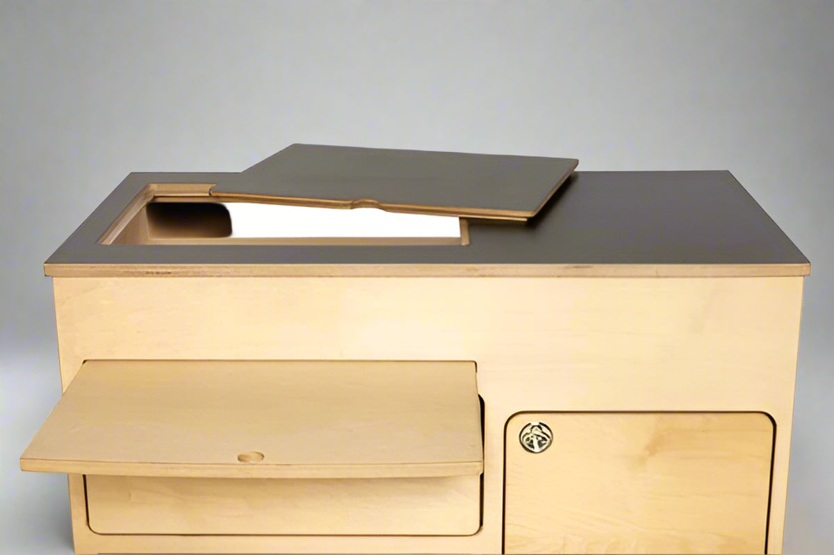 Top view of birch plywood 36" kitchen cabinet with black laminate top by Overland Interiors