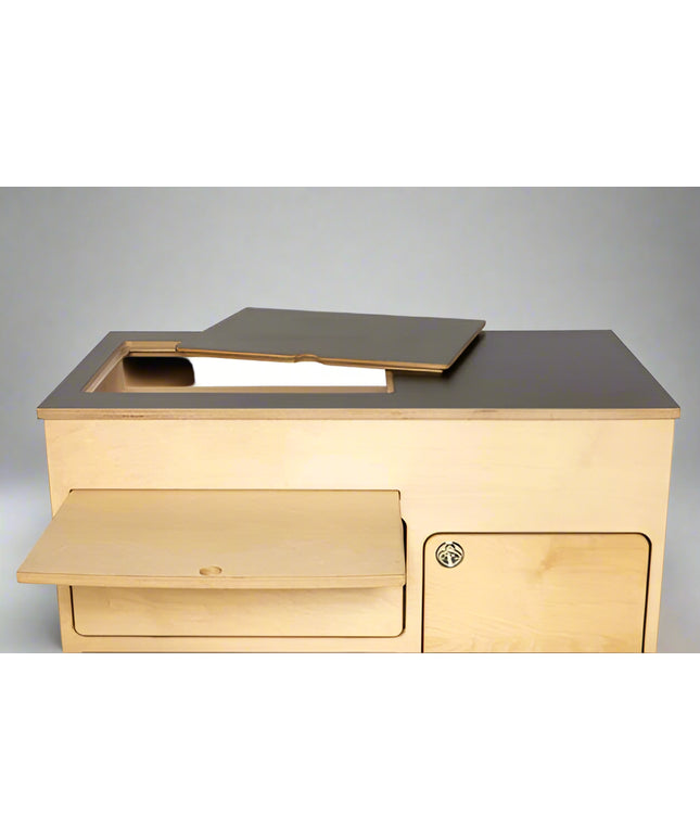 Top view of birch plywood 36" kitchen cabinet with black laminate top by Overland Interiors
