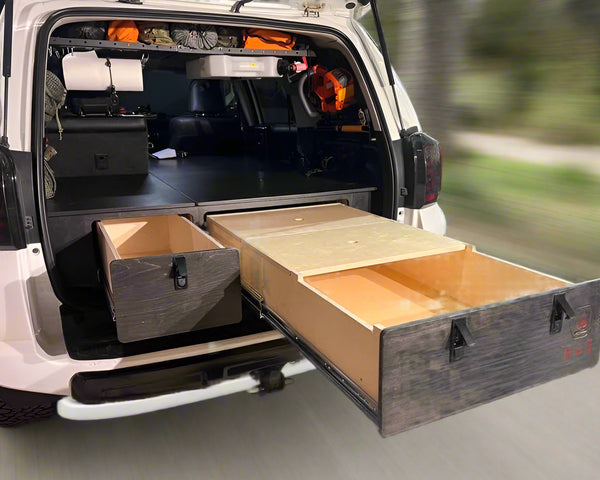 4Runner sleeping platform and pull-out drawer system installed for overland travel and SUV camping by Overland Interior