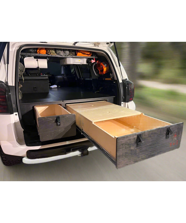 4Runner sleeping platform and pull-out drawer system installed for overland travel and SUV camping by Overland Interior