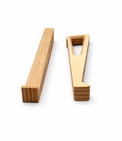 Baltic birch ergonomic laptop stand components shown before assembly by Overland Interiors.