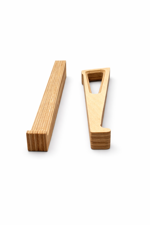 Baltic birch ergonomic laptop stand components shown before assembly by Overland Interiors.