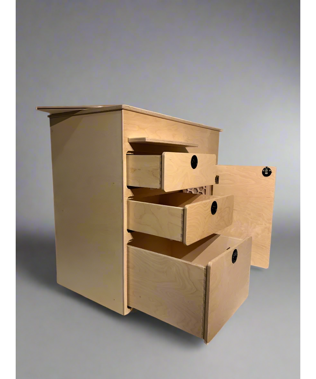 Camper van kitchen cabinet with open drawers and storage compartment by Overland Interiors