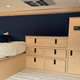 Overland Interiors camper van electrical utility cabinet with built-in power controls and storage for van conversions