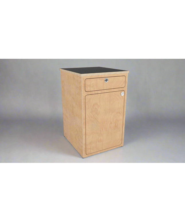 Angled view of a camper van storage cabinet with integrated drawer and utility storage by Overland Interiors.