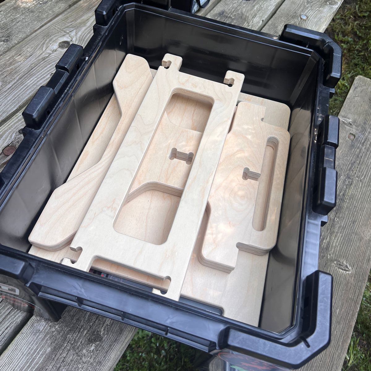 Flat pack camper van step stool components with tool-free assembly and compact storage by Overland Interiors