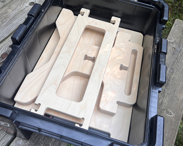 Flat pack camper van step stool components with tool-free assembly and compact storage by Overland Interiors