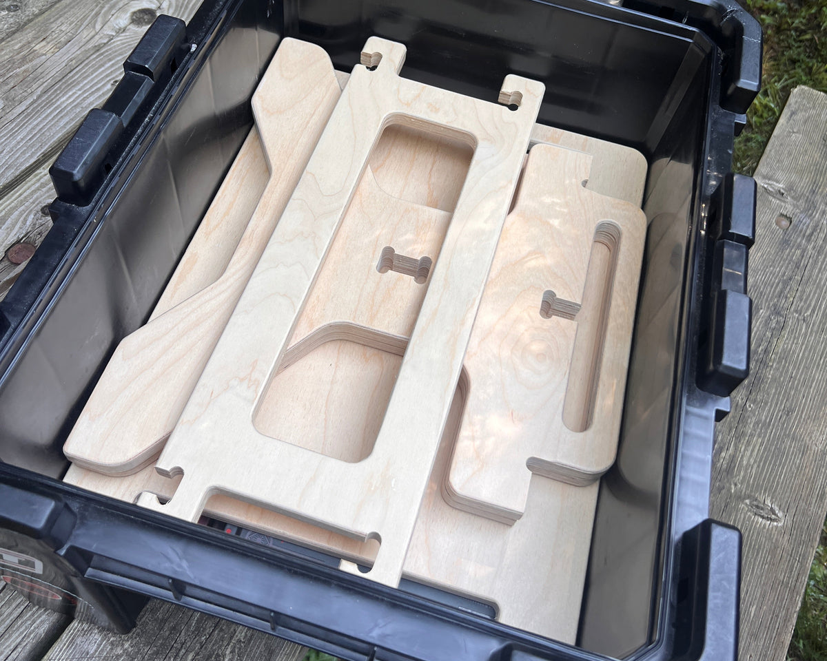 Flat pack camper van step stool components with tool-free assembly and compact storage by Overland Interiors