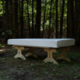 Flat pack camping bench platform assembled with a cushion for outdoor seating by Overland Interiors