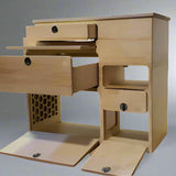 Micro camper van kitchen cabinet with open drawers, storage compartments, and utility access by Overland Interiors.