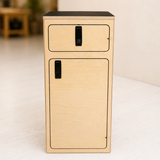 Front view of the Overland Interiors One+One Base Cabinet in birch plywood with upper drawer, lower storage cabinet, black compression latches and black laminate top