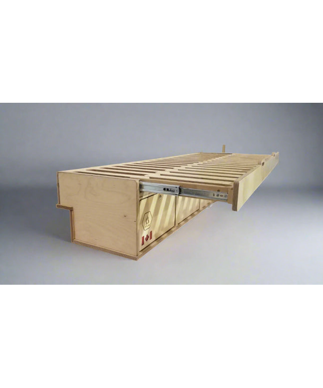 
Overland Interiors slide-out single sleeper van bed platform for low roof camper van conversions