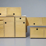 Modular Ford Transit camper van conversion kit components including cabinetry, storage, and interior furniture by Overland Interiors.