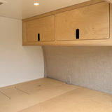 Overland Interiors overhead camper van storage cabinet designed for low roof van conversion kits