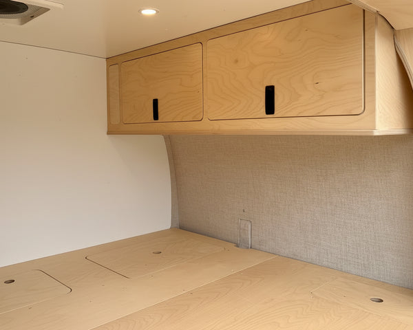 Overland Interiors overhead camper van storage cabinet designed for low roof van conversion kits