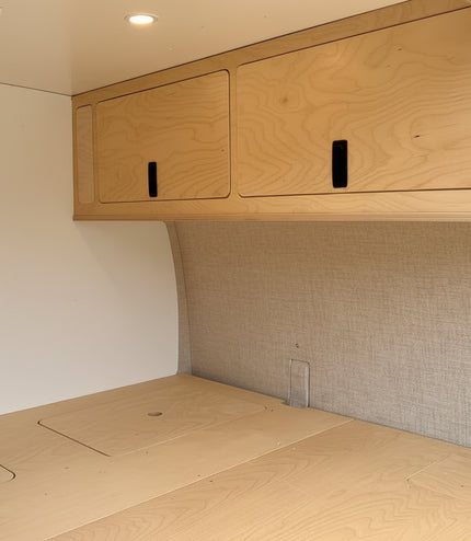 Overland Interiors overhead camper van storage cabinet designed for low roof van conversion kits