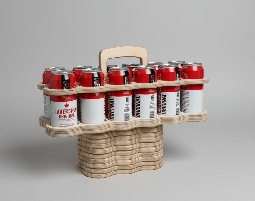 Wooden 12-pack beverage carrier made from birch plywood by Overland Interiors.