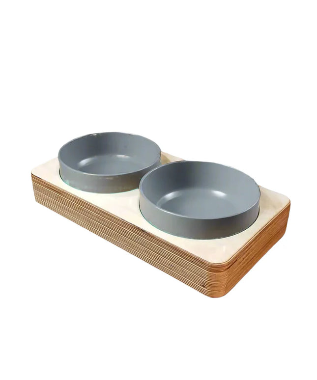 Stabilizing, two bowl, pet stand made from birch plywood with durable epoxy finish. Van life for pets
