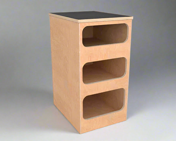 overland interiors' birch plywood base cabinet with three compartments and black laminate top  