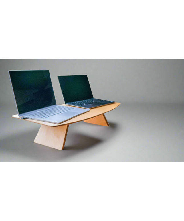 Image of two laptops on top of a birch plywood mini desk.  The perfect solution for working on the road in your camper van