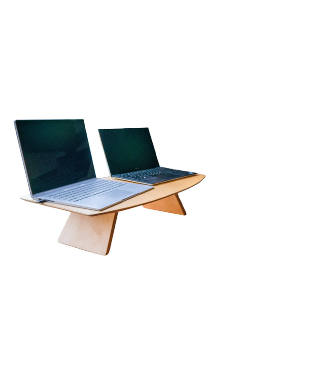Image of two laptops on top of a birch plywood mini desk.  The perfect solution for working on the road in your camper van