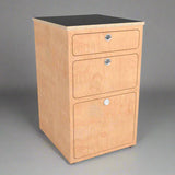 Overland Interiors' three compartment birch plywood cabinet for vans