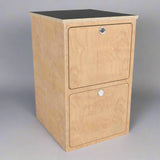 Overland Interiors' birch plywood base cabinet with two deep drawers and black laminate top 