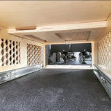 inside of Overland Interiors' bed platform showing drawer capacity and honeycomb ventilation 
