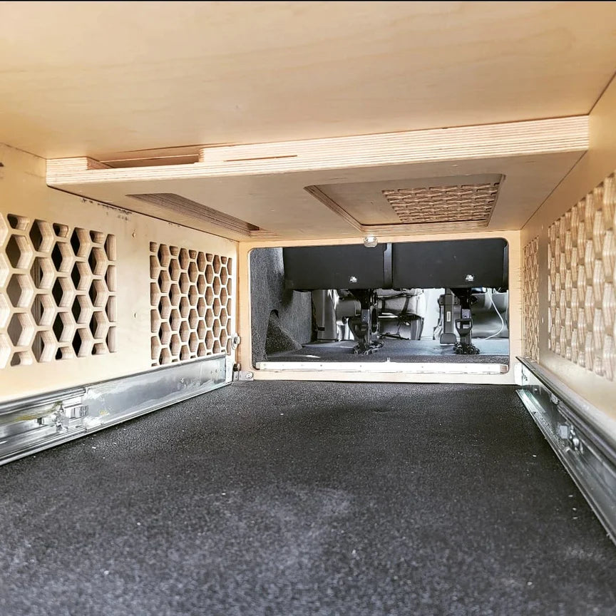 inside of Overland Interiors' bed platform showing drawer capacity and honeycomb ventilation 
