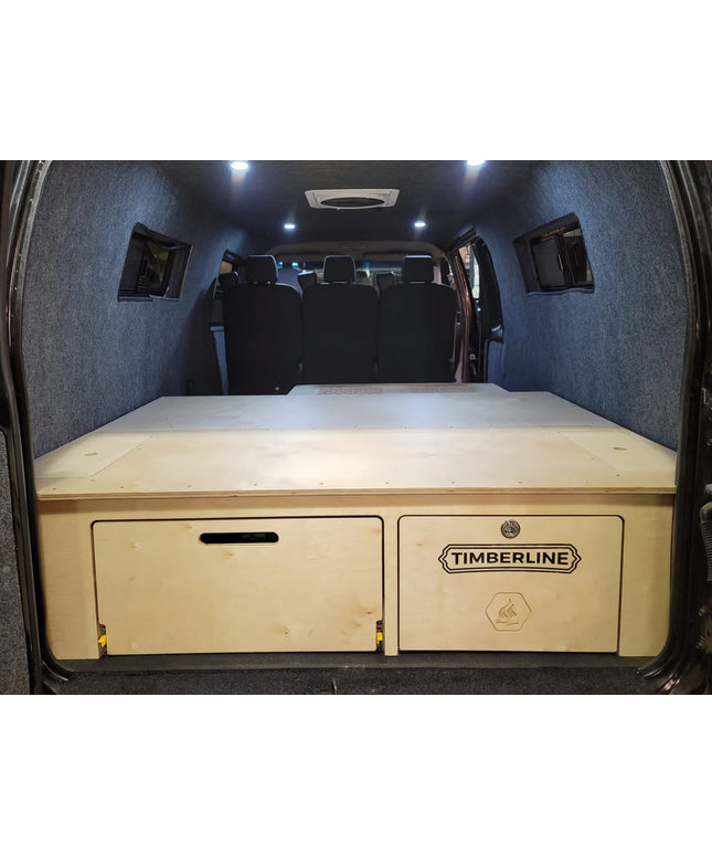 full view of sleeping platform with two generous drawers for storage - great for low or high roof camper vans! 